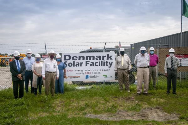 Gathering in front of a Dominion Energy-owned solar project in Denmark, South Carolina.