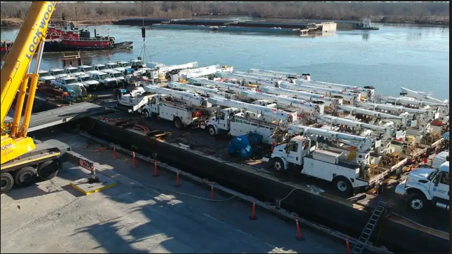 Barge containing Dominion Energy trucks leaves Charles City, VA heading to Puerto Rico