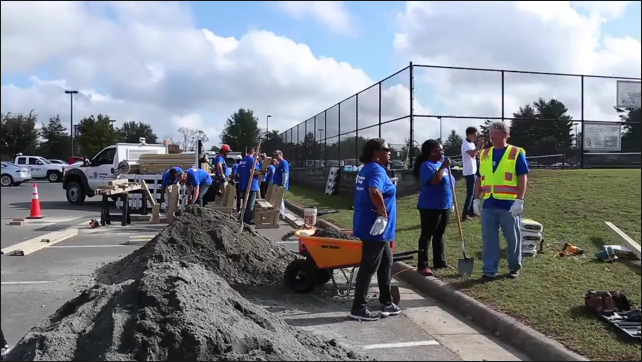 James Monroe High student helps build benches with Dominion Energy volunteers
