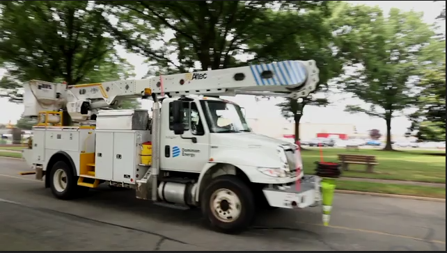 Video footage of Dominion Energy trucks and linemen
